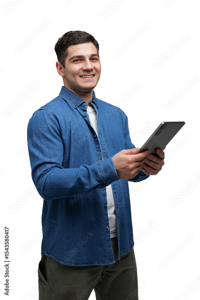 Young man with a friendly smile interacting with a tablet, expressing joy Young man with a friendly smile interacting with a tablet, expressing joy