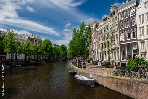 Photography Amsterdam, Netherlands – May 21, 2025: A panoramic view of an Amsterdam canal, b