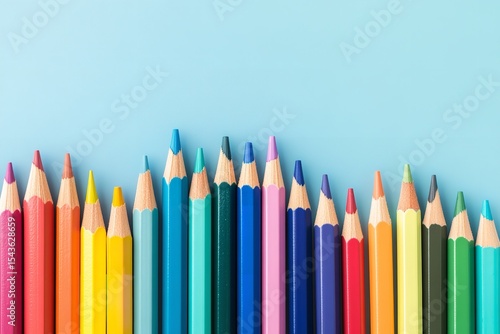 Colorful Pencils Arranged as Upward Graph Symbolizing Growth and Progress in Educational Online Learning