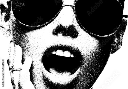 Edgy girl with fierce expression and lip ring in high contrast black and white