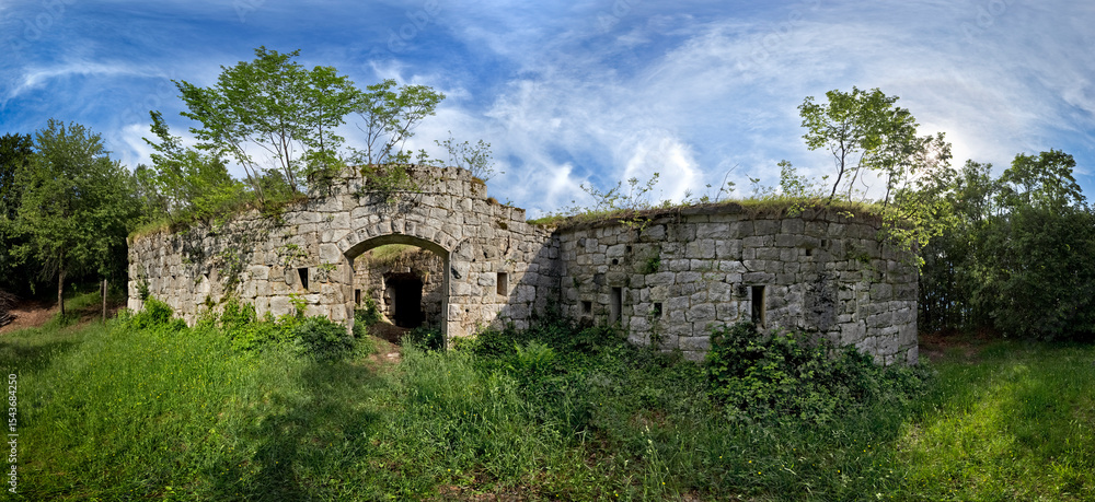 Fototapeta premium Fort Brusafer, Austro-Hungarian historical site of the Great War: on the left the entrance portal. Valsorda, Trento, Trentino, Italy.