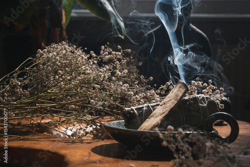 Burning Palo Santo And Sage With Dried Flowers
