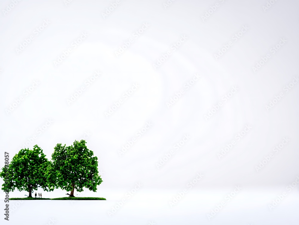 Obraz premium Two trees on a patch of grass against a plain background