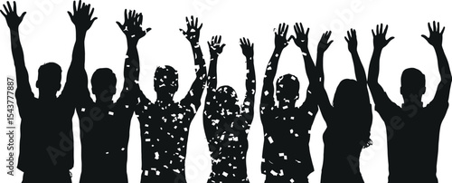 Silhouette of people with raised hands celebrating under falling confetti