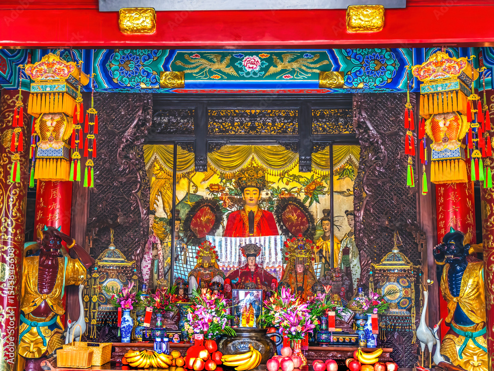 Fototapeta premium Colorful Mazu Sea Goddess altar, Tianhou Temple, Guwenhua Jie, Tianjin, China. Temple to pray for safety of navigation. Temple first created 1326 in Yuan Dynasty.
