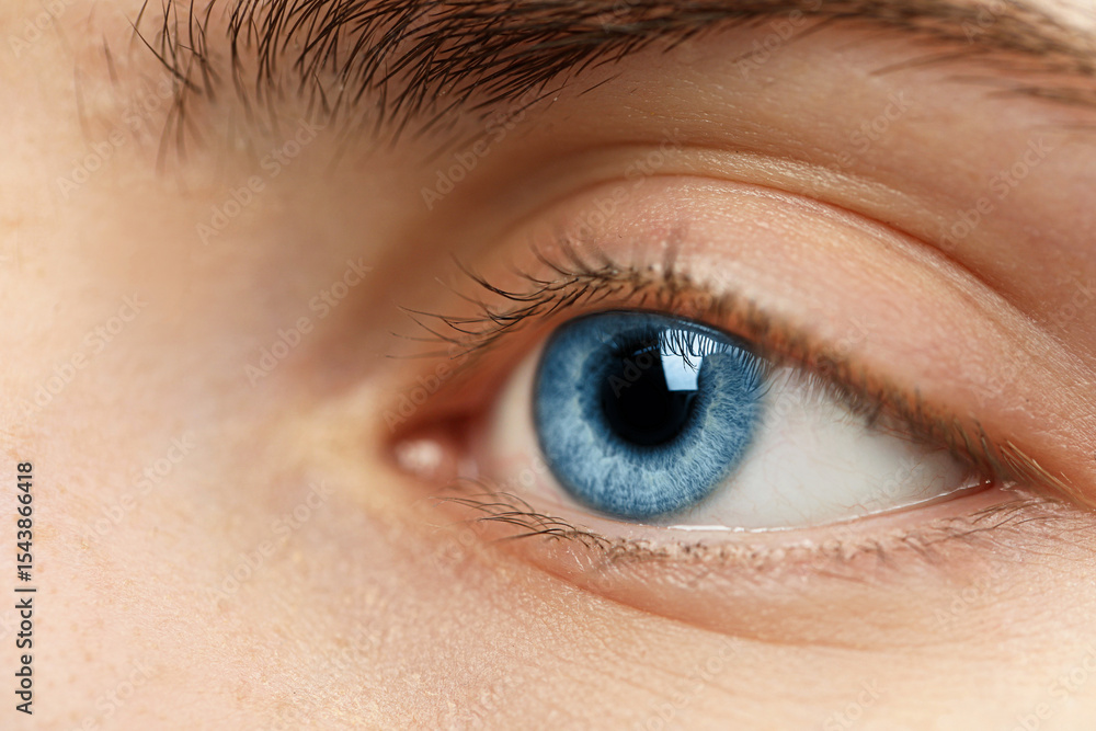 Obraz premium Closeup view of woman with blue eyes