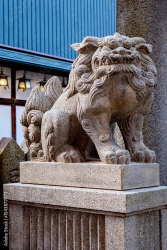 Stone lion, symbol of peace of tranquility, Kyoto, Japan