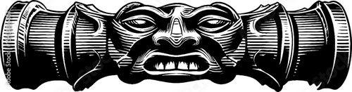 Intricately carved totemic staff with symbolic faces in black for cultural art design