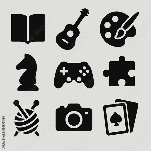 Silhouette hobby icon set showing activities like music, reading, gaming, photography, painting and knitting.