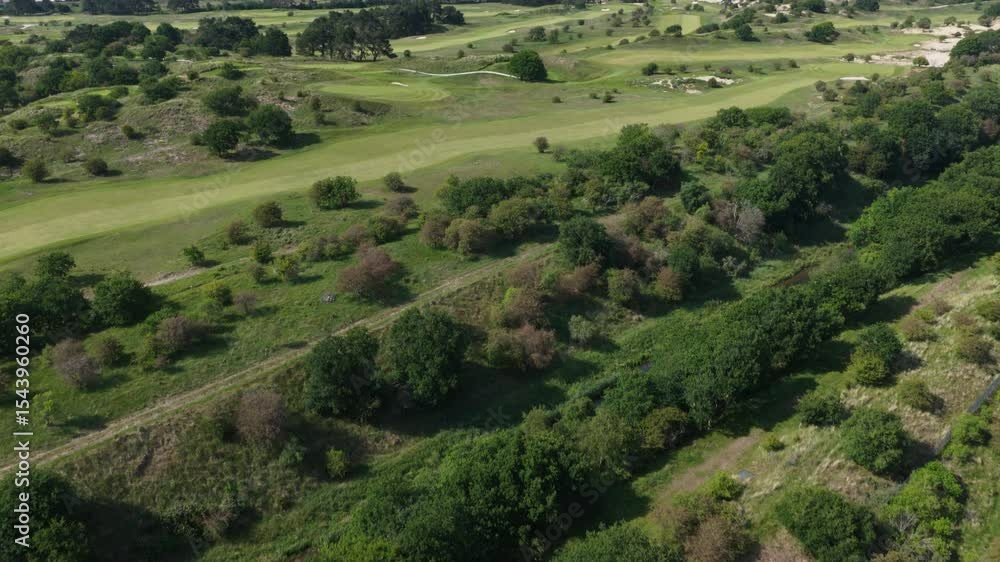 Kennemer Golf and Country Club, golf course in the dunes at Zandvoort. Sports and recreation. Aerial video. Kennemer Golf and Country Club, golf course in the dunes at Zandvoort. Sports and recreation. Aerial video.