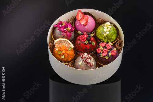 fruit berry tea in transparent balls and heart.