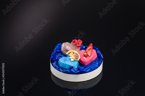 fruit berry tea in transparent balls and heart.