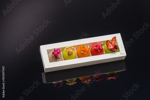 fruit berry tea in transparent balls and heart.