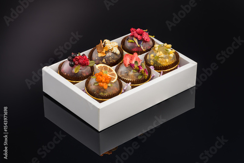 fruit berry tea in transparent balls and heart.