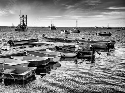 USA, Massachusetts, Cape Cod, Chatham. The dinghy dock in Chatham Harbor at s...