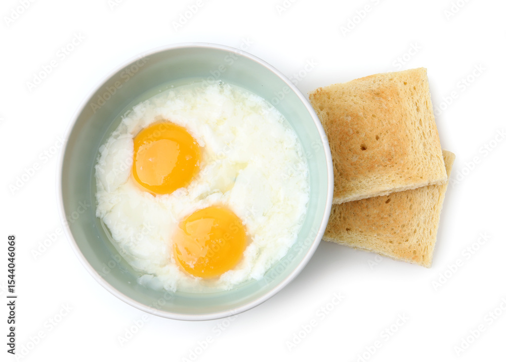 Fototapeta premium Half-boiled eggs in bowl and toasts isolated on white, top view. Traditional asian breakfast