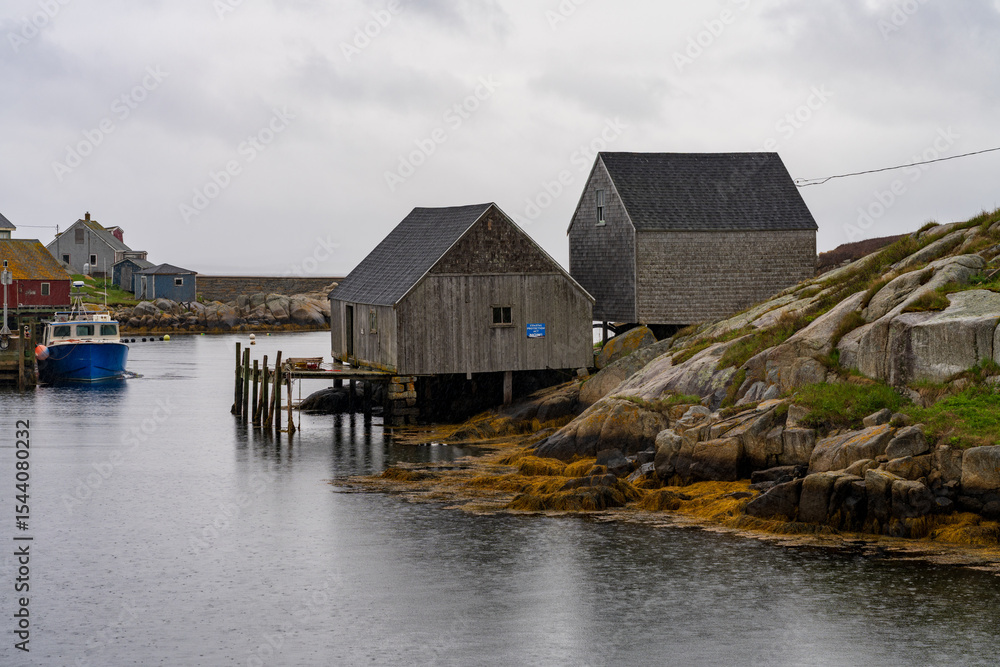 Rain keeps tourists away from the harbour of Peggys Cove near Halifax in Nova Scotia, Canada Rain keeps tourists away from the harbour of Peggys Cove near Halifax in Nova Scotia, Canada