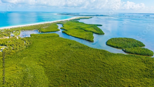 Drone View of Caladesi Island and Marina with Hurricane Pass and Honeymoon Island in the distance.  This is Florida Gulf coast paradise from the air.