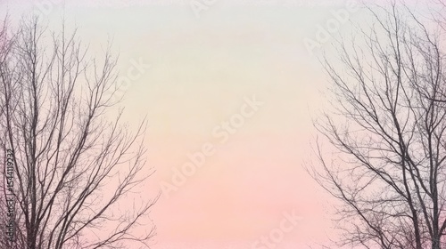 Bare branches against a pastel sky.
