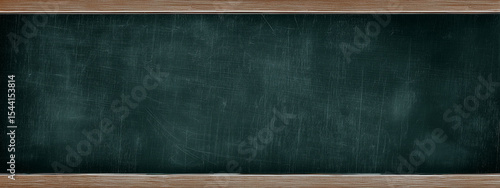 Empty green chalkboard with wooden frame for educational background