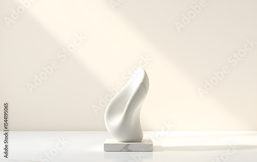 Abstract marble statue on an elegant base. Suitable for art and design concepts, interior decoration, and historical references in advertising.
