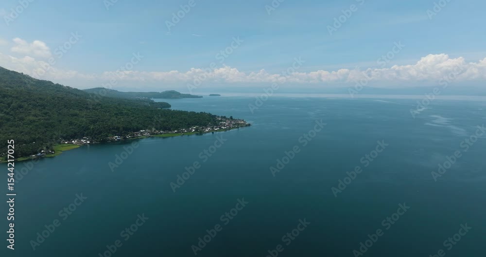 Aerial view of villages in coastline of lake Lanao in Lanao del Sur. Mindanao, Philippines. Aerial view of villages in coastline of lake Lanao in Lanao del Sur. Mindanao, Philippines.