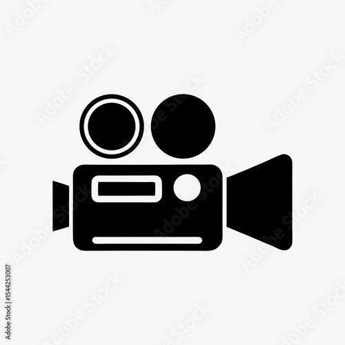 Black silhouette of vintage movie camera icon with dual reels on white background
