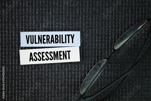 Canvas Print colored paper with the word vulnerability assessment