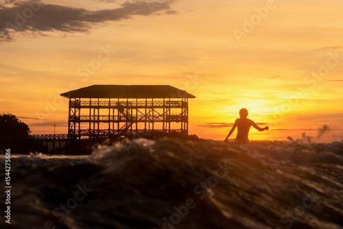 Sunsets and Sunrises Cloud 9 Tower in Siargao Island, The Philippines.