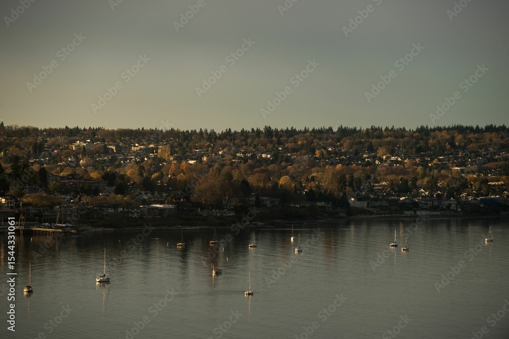 Fototapeta premium Boats in lake against sky