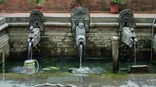 Ancient Dhunge dhara (hiti) in Patan Durbar Square
