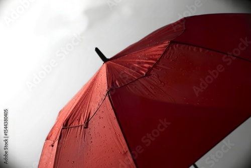 an abstract close-up of a vibrant red umbrella.