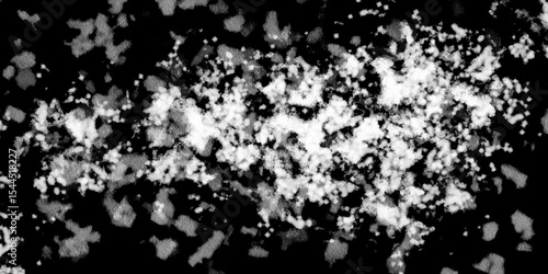 Snowflakes on dark background. white icy snowflakes isolated on black background, natural background. white crystalline powder on a black background. sugar dust. texture, pattern and clipping.
