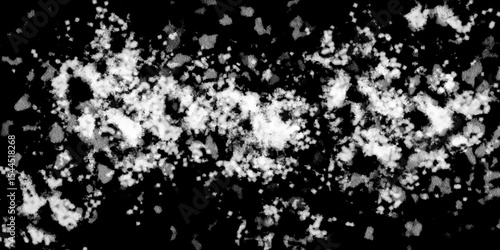 Snowflakes on dark background. white icy snowflakes isolated on black background, natural background. white crystalline powder on a black background. sugar dust. texture, pattern and clipping.
