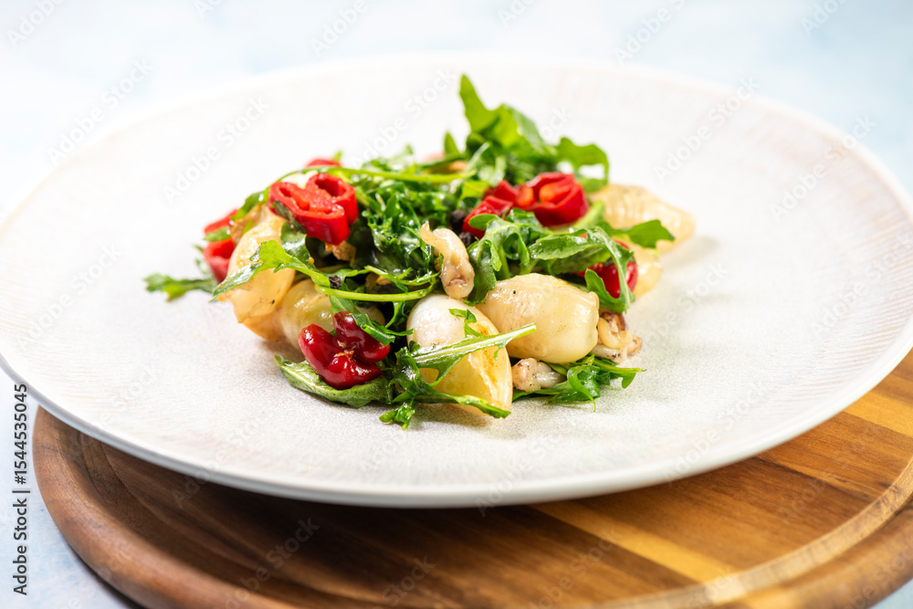 Calamari with salad and red peppers Calamari with salad and red peppers