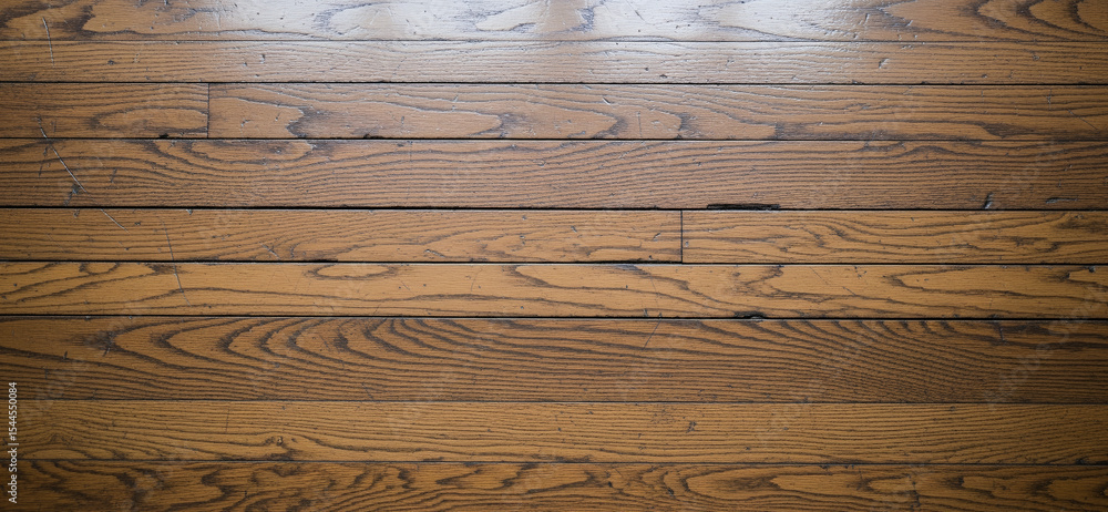 Fototapeta premium Rustic floor design with heavily used planks and surface irregularities framed in a horizontal clean DSLR composition.