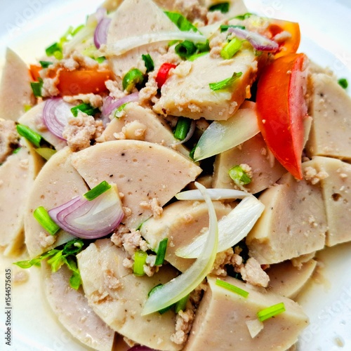 Wallpaper Mural Flavorful Vietnamese Sausage Salad: A vibrant Vietnamese salad bursting with color and flavor. Featuring tender slices of Vietnamese sausage, fresh herbs, savory minced meat. Torontodigital.ca