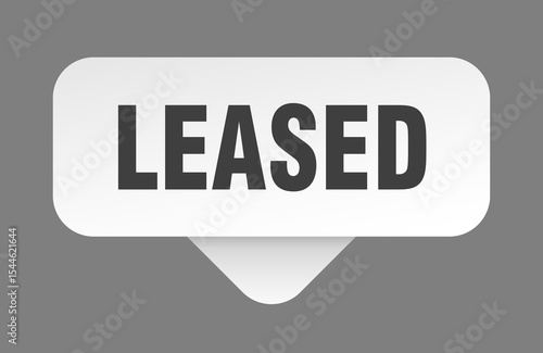 leased sticker. leased sign isolated on gray background
