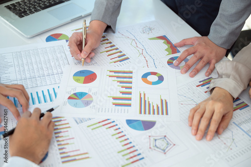 Business team working meeting and discussion for financial planning, business strategies and marketing research.