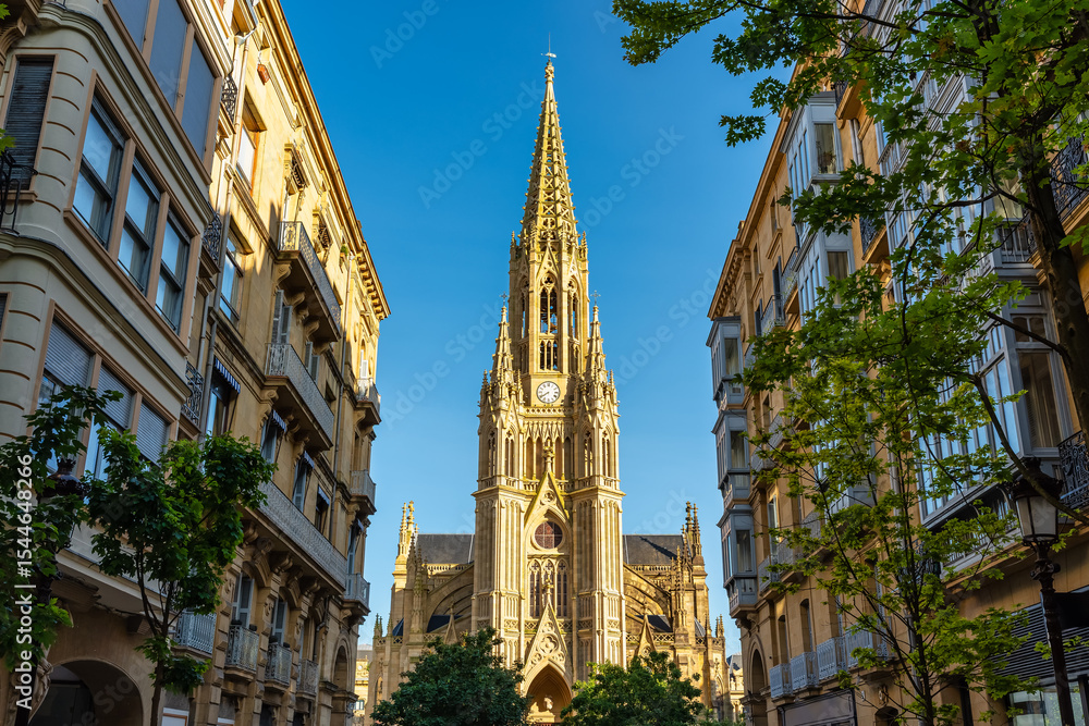 Fototapeta premium Main tower and bell tower of the Cathedral of the Good Shepherd in the Basque city of San Sebastian, Spain.