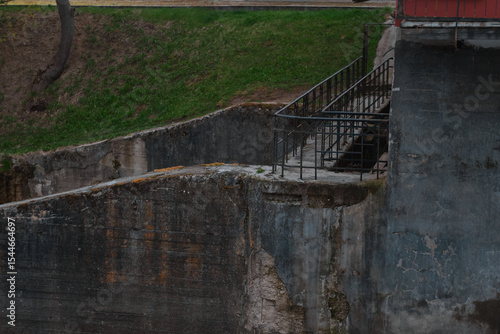 Dam of small hydroelectric power station, water discharge through locks