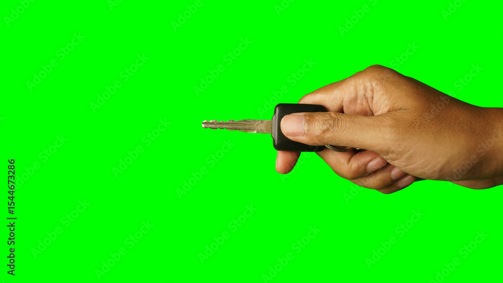 Hand holding car key. Green screen background Hand holding car key. Green screen background