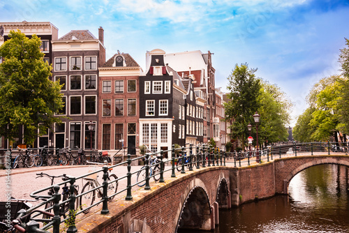 Canal with boats in Amsterdam city, Netherlands