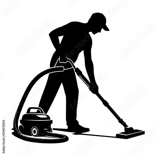 Silhouette of a man vacuuming a floor