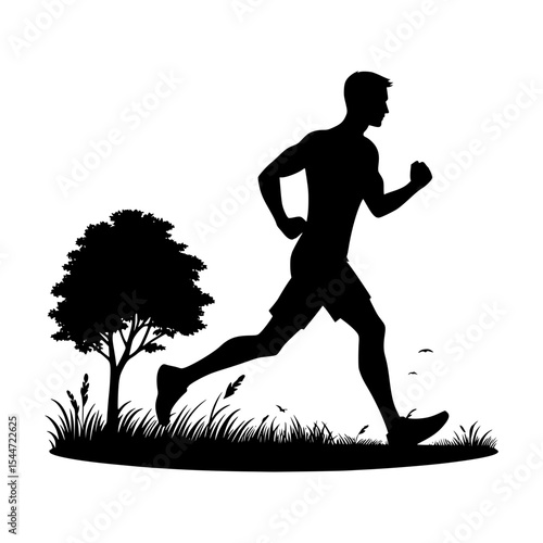 Silhouette of a man jogging in a park