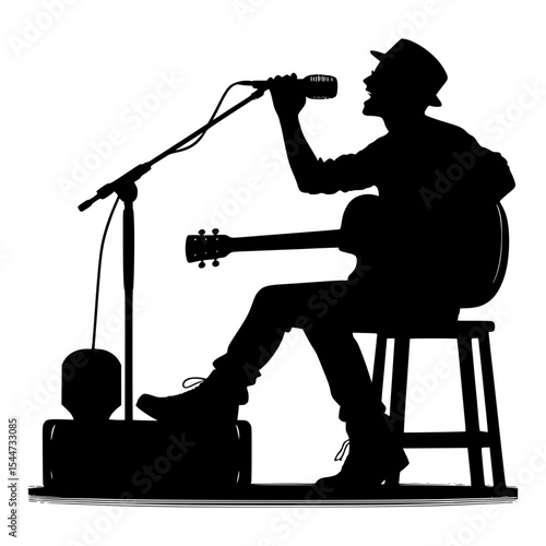 Silhouette of singer songwriter performing on stage