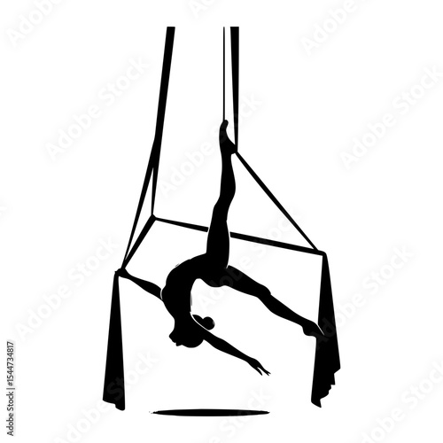 Silhouette of a woman performing aerial silk
