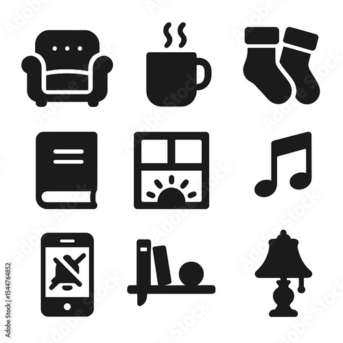 Cozy Weekend Icons. Solid, filled icons set of relaxing weekend reading: overstuffed chair, steaming mug,