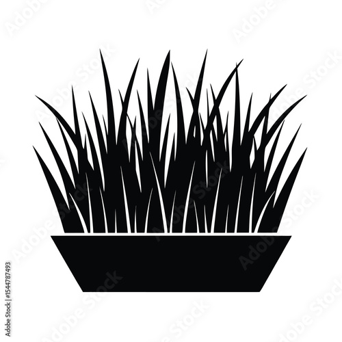 Black silhouette of grass in pot