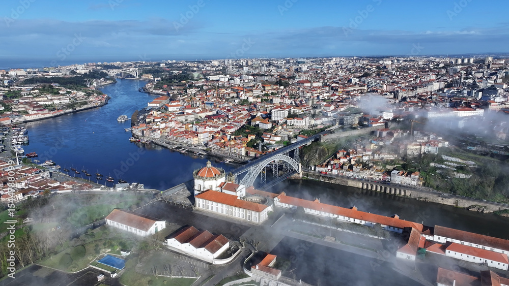 Fototapeta premium Porto Skyline At Porto In District Of Porto Portugal. Coastal City. Fog Morning Landscape. Medieval Buildings Scenery. Porto Skyline In Portugal. Portugal Skyline. Travel Landscape.